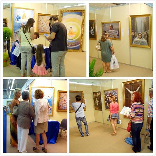 '观看画展的人们络绎不绝'
