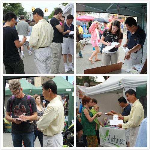 安娜堡艺术节上,人们驻足聆听法轮功真相并签名反对迫害