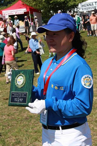 图7：法轮功学员获得军乐队类表演一等奖