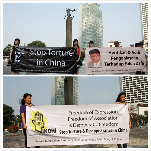 法轮功学员在市中心揭露中共邪<span