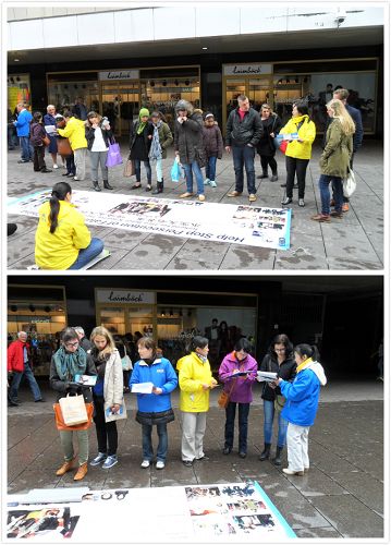 海牙商业区步行街举行洪法讲真相活动吸引很多民众驻足观看,了解真相