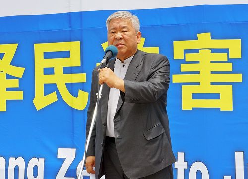 图14:图为首尔朝鲜族教会牧师徐京锡演讲。