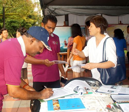 图9:SCI槟城分会主席阿迪穆兰先生签名谴责中共暴行。