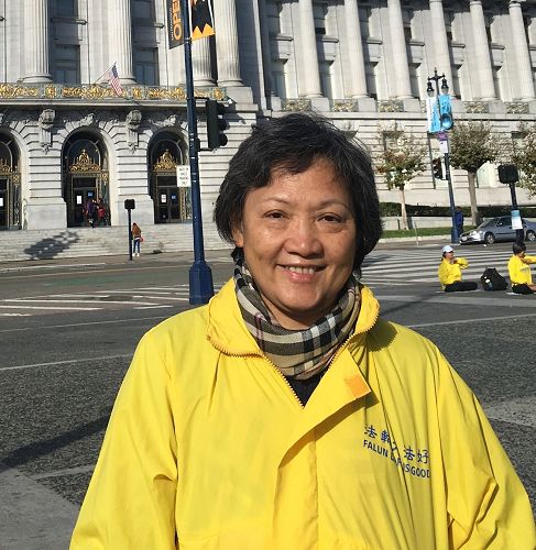 '图3:香港刘女士:能和全世界同修一起参加这种大型的讲真相活动,殊胜难得'