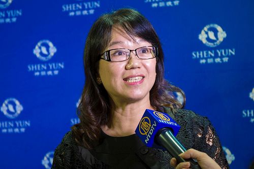 '图8:高雄市爱乐协会理事长吴淑如:“《优昙婆罗花》,旋律非常优美,让人很恬静,好像神佛就在身边,心里充满了希望、很开心、温馨。”'