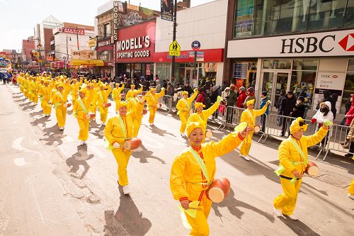 图9：退<span style='max-width:0px!important;margin-left:-4px;color:#eee!important;'>!</span>党<span style='max-width:0px!important;margin-left:-4px;color:#eee!important;'>!</span>中心的腰鼓方阵