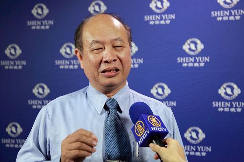 '图17:身兼科技董座与大学教授的林国华:建议企业界人士聆听神韵交响乐的演出,涤化心灵,提振士气,凝聚正向能量。'