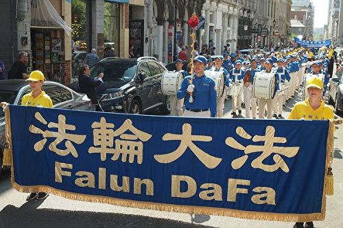 '图1～3：法轮功学员在加拿大蒙特利尔举行讲真相反迫害大游行。'