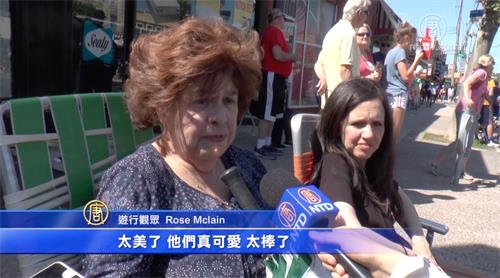 图5：Rose McLean女士非常喜爱法轮功学员的彩旗队。