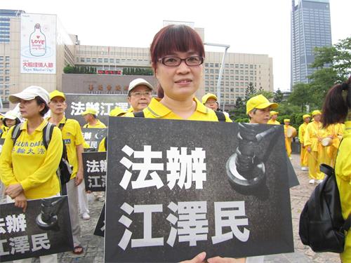 '图3：钟惠勤祈愿广传大法美好的真相，世界会更和平。'