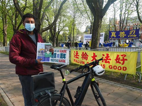 '图4:阿贝·丁贝克(Ab Dimbeko)反对中共迫害法轮功。'