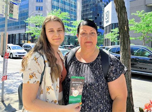 图10：蒙特利尔市民Suzie（右）看到四亿人“三<span style='max-width:0px!important;margin-left:-4px;color:#eee!important;'>:</span>退<span style='max-width:0px!important;margin-left:-4px;color:#eee!important;'>.</span>”的消息后很受触动，几乎落泪