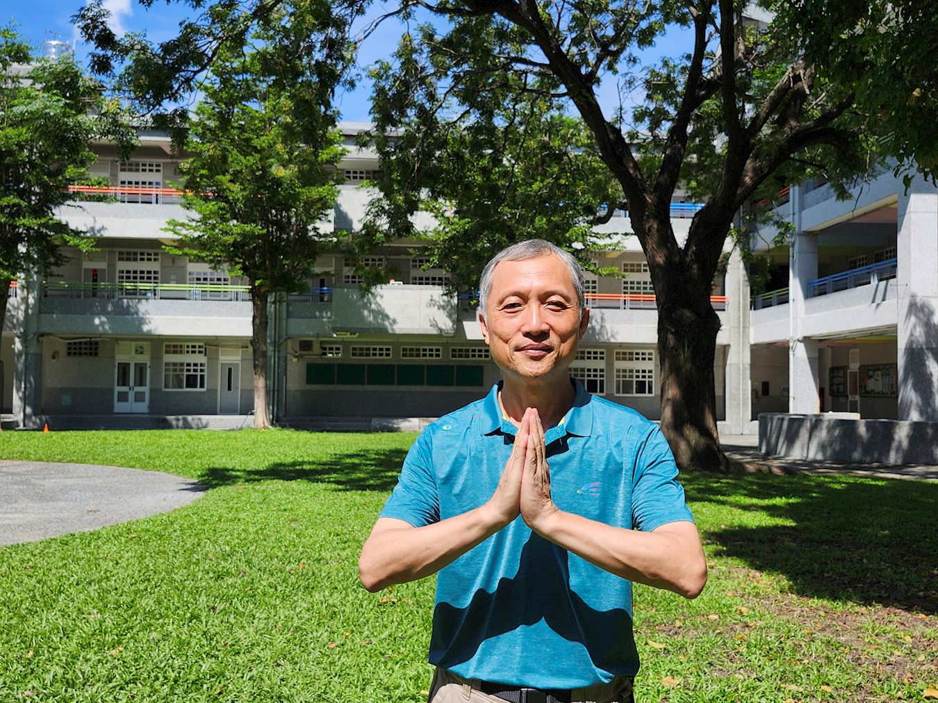 '图2:台湾南投的法轮功学员建兴希望把大法传给更多人知道,以报师恩。'