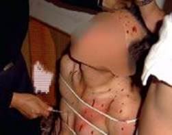 '中共酷刑演示：绑在铁椅子上折磨'